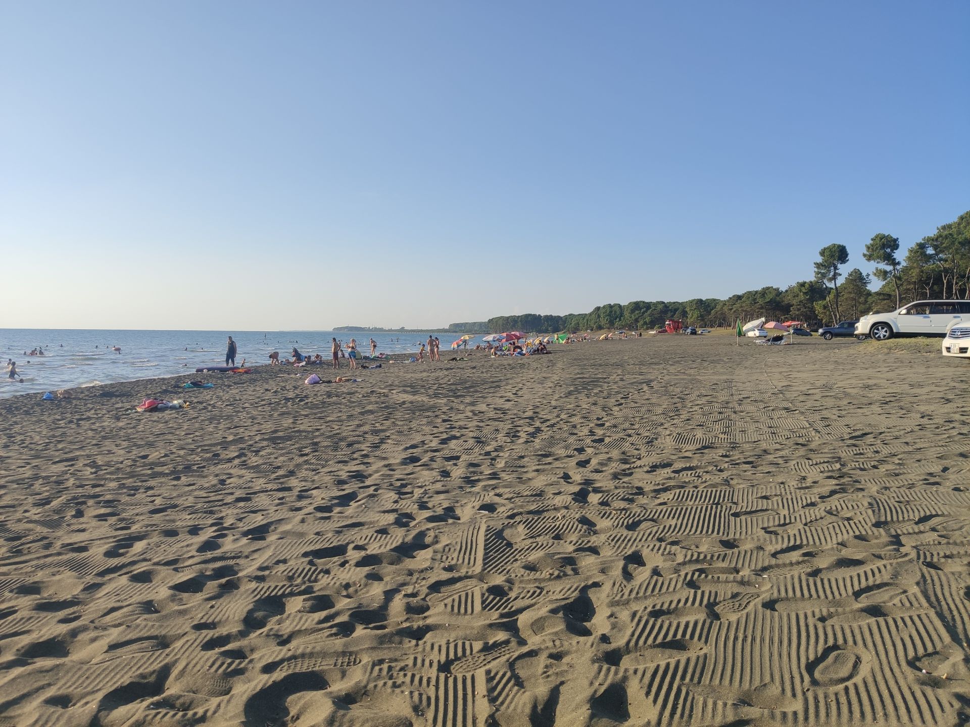 Fotografija Ureki Nature beach z črni pesek površino